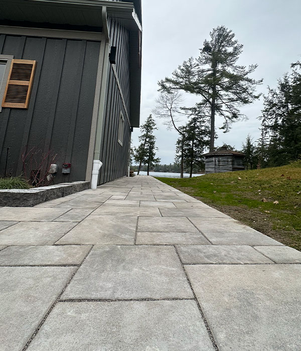 Interlocking stone on side walkway